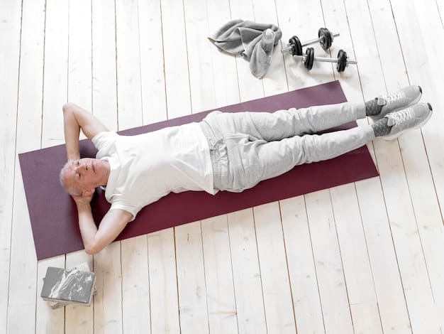 A person lying on their back on a yoga mat, eyes closed, with their arms resting comfortably at their sides, palms facing upwards. The room is dimly lit, creating a relaxing and introspective atmosphere, emphasizing the practice of a body scan meditation.