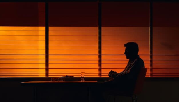 An entrepreneur sitting alone in a dimly lit office late at night, looking contemplative but showing a subtle hint of determination and perseverance.
