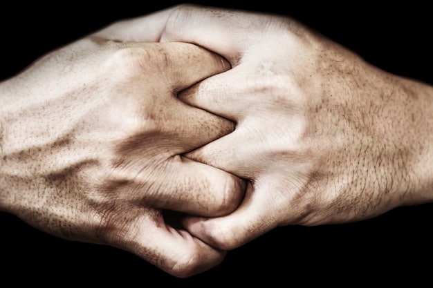 A close-up shot of two hands intertwined, one slightly trembling, symbolizing the vulnerability and fragility of trust.