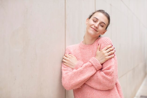 A person hugging themself with a comforting expression, symbolizing self-compassion and self-care. The background is soft and blurred to convey a sense of peace.
