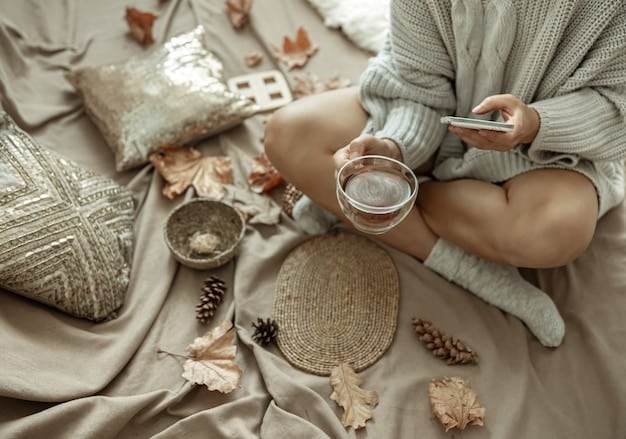 A cozy and inviting meditation space with dim lighting, soft cushions, candles, and calming crystals arranged on a small table. A person is sitting comfortably in a meditative pose.