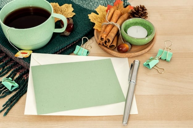 A desk with a notebook, pen, and a cup of tea. The notebook is open to a blank page, ready to be filled with gratitude entries.
