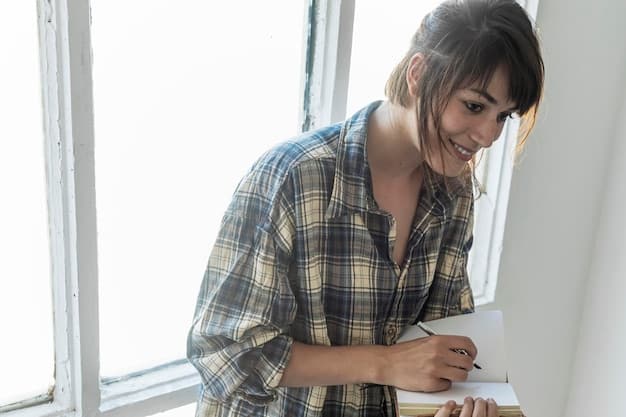 A person writing in a journal with a pen and smiling. The background is a cozy living room with plants and soft lighting, emphasizing the importance of self-reflection and a positive environment during addiction recovery.