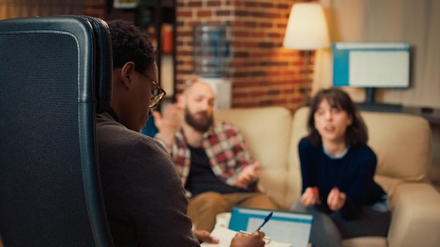 An individual meeting with a counselor, discussing their aftercare plan and setting future goals for their continued sobriety.