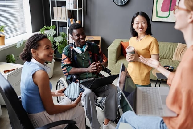 A diverse team collaborating happily in a modern, open-plan office, signaling support and positive interactions as critical elements in fostering emotional resilience in the workplace.
