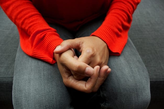 A close-up of hands clasped together, fingers entwined, representing the mental struggle and tension associated with anxiety.