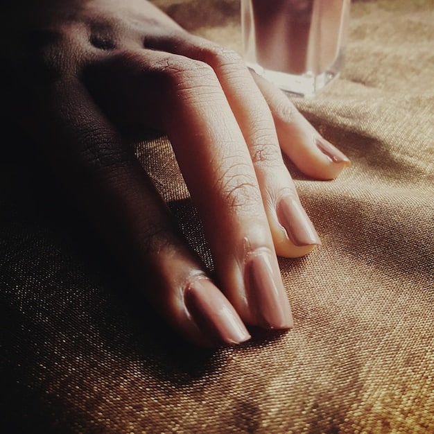 A close-up shot of hands gently resting in a meditative pose, symbolizing serenity and focus.