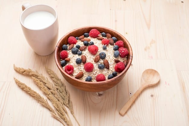 A close-up shot of a healthy breakfast consisting of a bowl of oatmeal with berries, nuts, and seeds, accompanied by a glass of freshly squeezed orange juice. The image should look vibrant, appealing, and indicative of a nutritious meal.