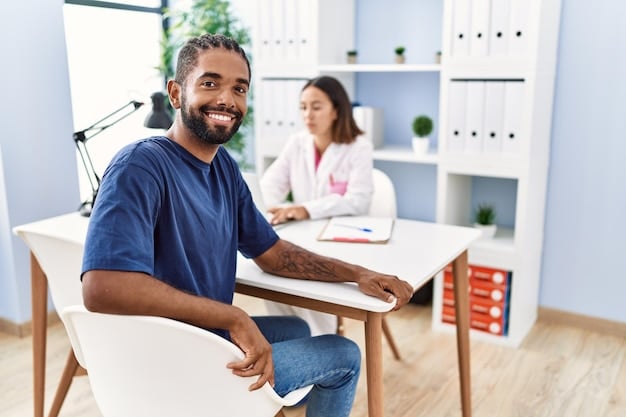 A healthcare professional sitting across from a patient, both smiling, in a bright, welcoming office setting. They are discussing the patient's treatment plan, highlighting the collaborative and supportive nature of MAT.