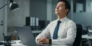 US professional practicing mindfulness at desk for focus