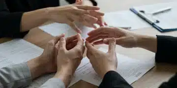 Hands reaching for support, symbolizing enhanced substance abuse treatment access in 2026.